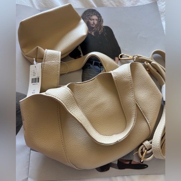 Anthropologie Handbags - Anthropologie mini Cream Mini Bag